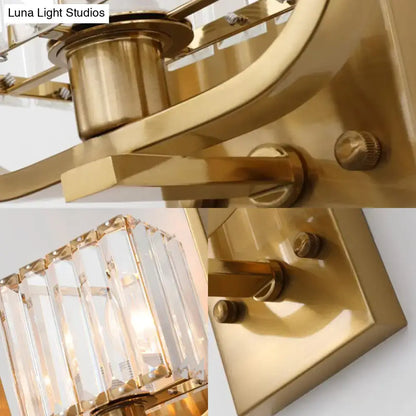 Vintage metal wall sconce with gold finish and crystal shade designed for elegant bedroom lighting