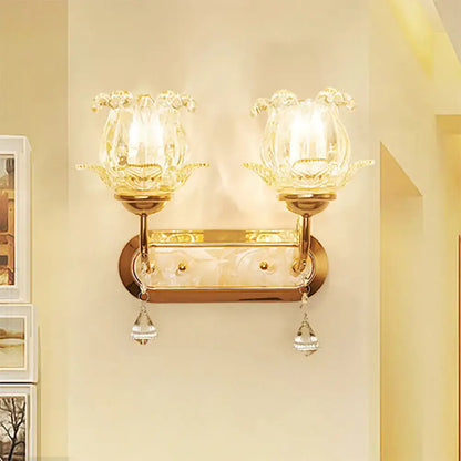 Vintage gold flower wall sconce with amber glass shade lotus flower design and dangling crystal teardrop pendants