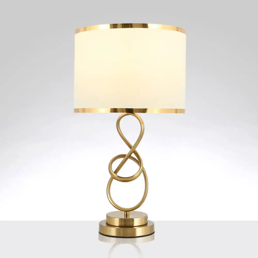 Decorbites vintage twist metallic nightstand lamp with gold-toned infinity base, coffee beige fabric shade, and inch fixture