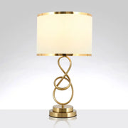 Decorbites vintage twist metallic nightstand lamp with gold-toned infinity base, coffee beige fabric shade, and inch fixture