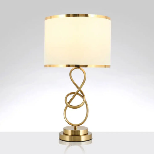 Decorbites vintage twist metallic nightstand lamp with gold-toned infinity base, coffee beige fabric shade, and inch fixture