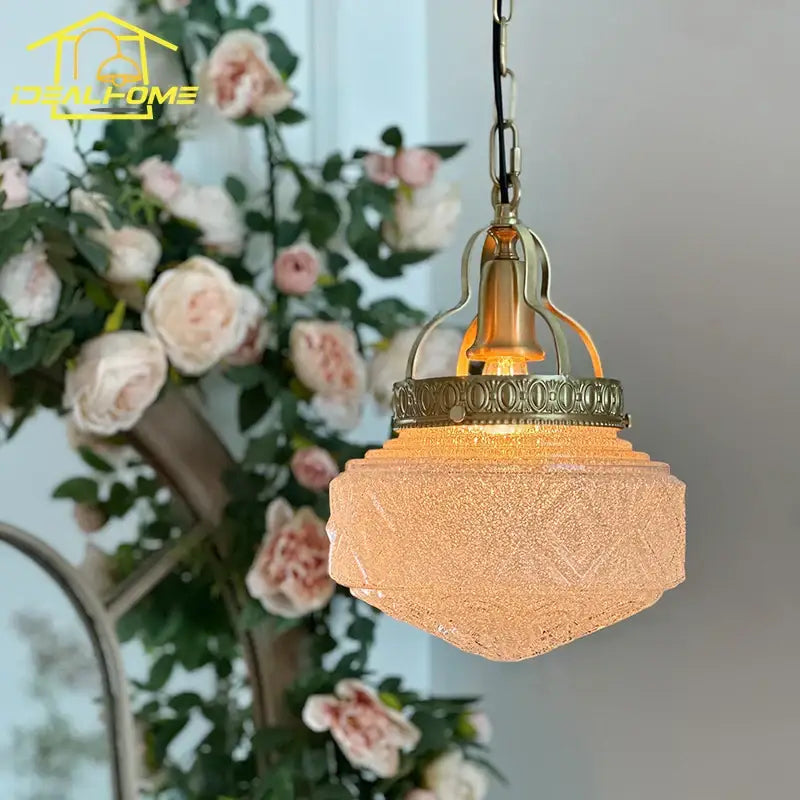 Vintage gold lustre pendant light with antique brass finish and amber tinted gold lustre glass for dining room decorbites