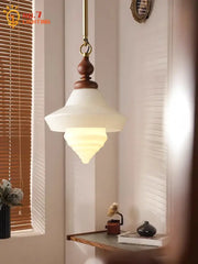 Vintage-style pendant lights with warm frosted gold lustre glass and polished brass fixture for kitchen island decorbites gold lustre