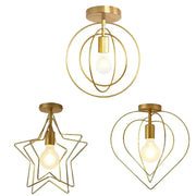 Vintage gold metal cage pendant light with exposed bulb designs in circular star and heart shapes for restaurant decor