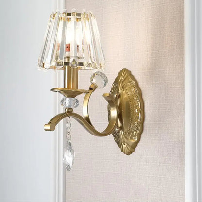 Vintage gold metallic wall lamp with crystal fringed shade and dangling crystals for bedroom lighting