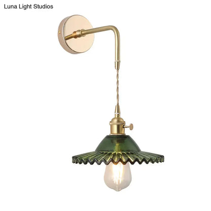 Decorbites™ vintage single-bulb bedside wall light with a gold brass base and green scalloped shaded glass wall fixture