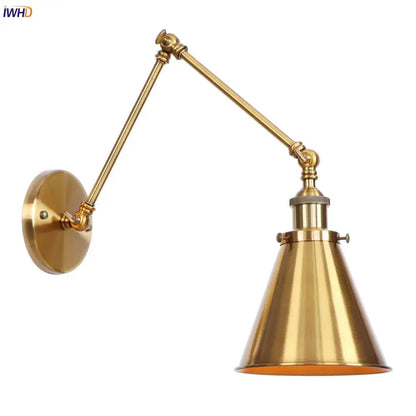 Vintage gold swing arm wall lamp with brass finish, adjustable conical shade, and articulated arm for bedroom use