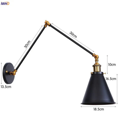 Black matte industrial wall lamp with brass accents and adjustable swing arm for vintage gold brass sconce style