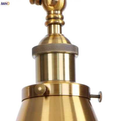 Vintage gold swing arm wall lamp with antique brass finish and knurled ring details industrial arm wall lamp