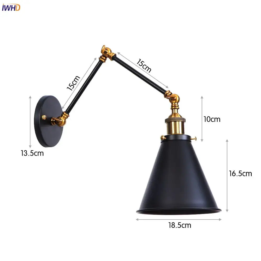 Black matte swing arm wall lamp with brass accents and adjustable arms for vintage industrial bedroom lighting
