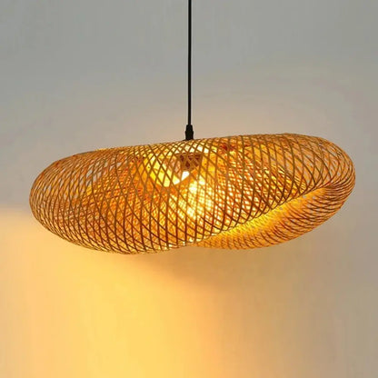 Warm-toned oval led pendant light made of golden bamboo with lattice design for dining room or living room use