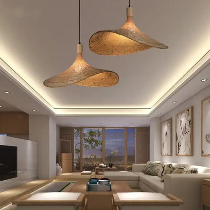 Two elegant light brown bamboo wicker chandelier pendant lights with a vintage design for dining room use