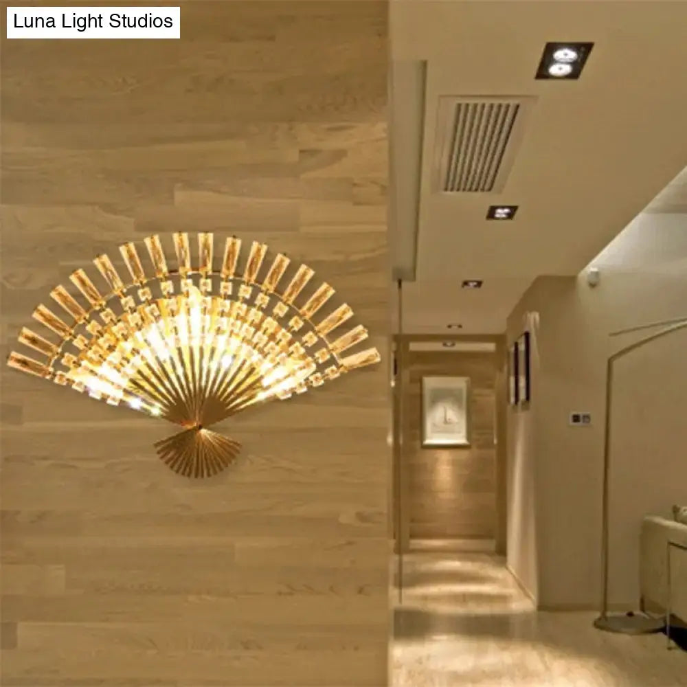 Vintage golden fan shaped sconce lamp with crystal accents for elegant living room wall lighting