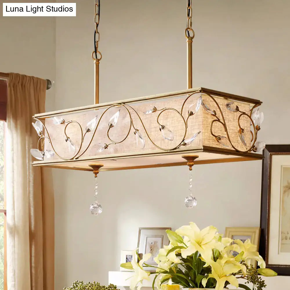 Vintage golden flax island pendant kitchen light with gold-toned metalwork, woven beige shade, and crystal leaf accents