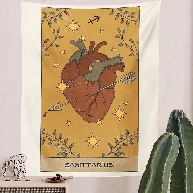 A mustard-yellow sagittarius constellation tarot tapestry with a detailed anatomical heart for decorbites constellation tarot decor