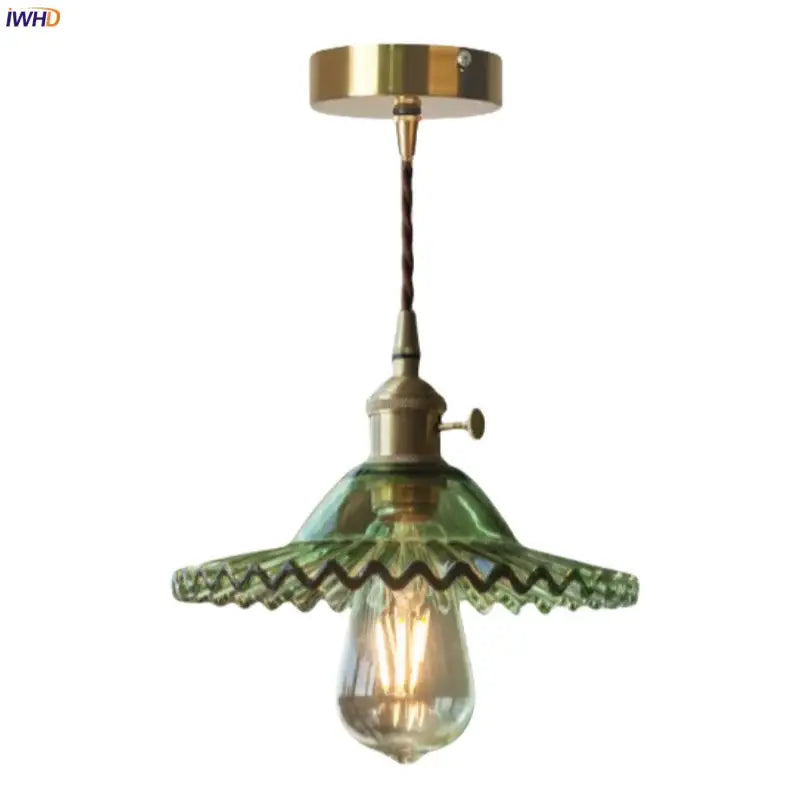 Vintage green brass glass led pendant light with brass fixture and twisted cord featuring ornate scalloped shade