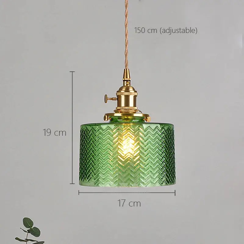 Vintage green and clear glass shade chandelier with textured chevron pattern and brass hardware for dining room use