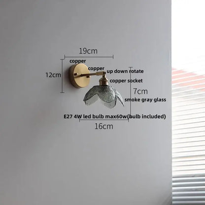 A copper vintage wall sconce with a smoke gray glass shade for bedroom or stair lighting with green glass led