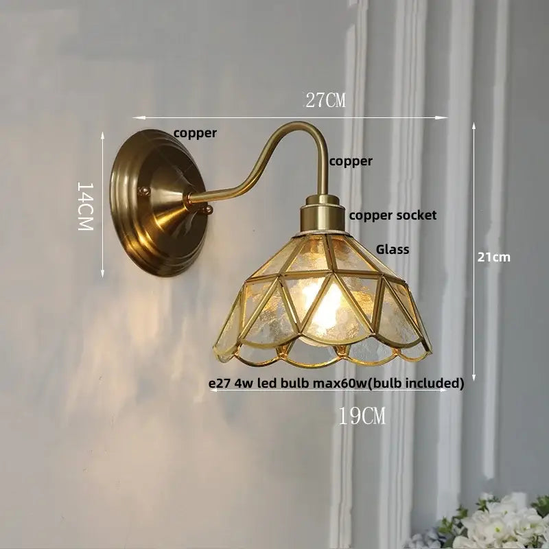 Antique brass wall sconce with a geometric green glass led shade for vintage star stair lighting
