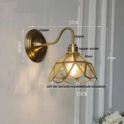 Antique brass wall sconce with a geometric green glass led shade for vintage star stair lighting