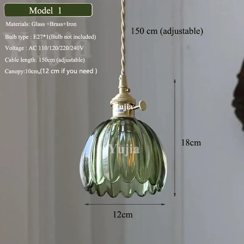 Vintage green glass pendant light with ribbed ruffled petal design brass fixture and adjustable cord for dining room