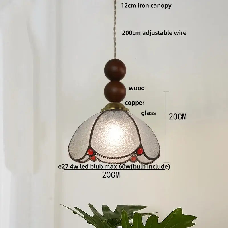 A vintage green glass pendant light with textured frosted shade copper accents and wood beads for dining room decorbites blue glass