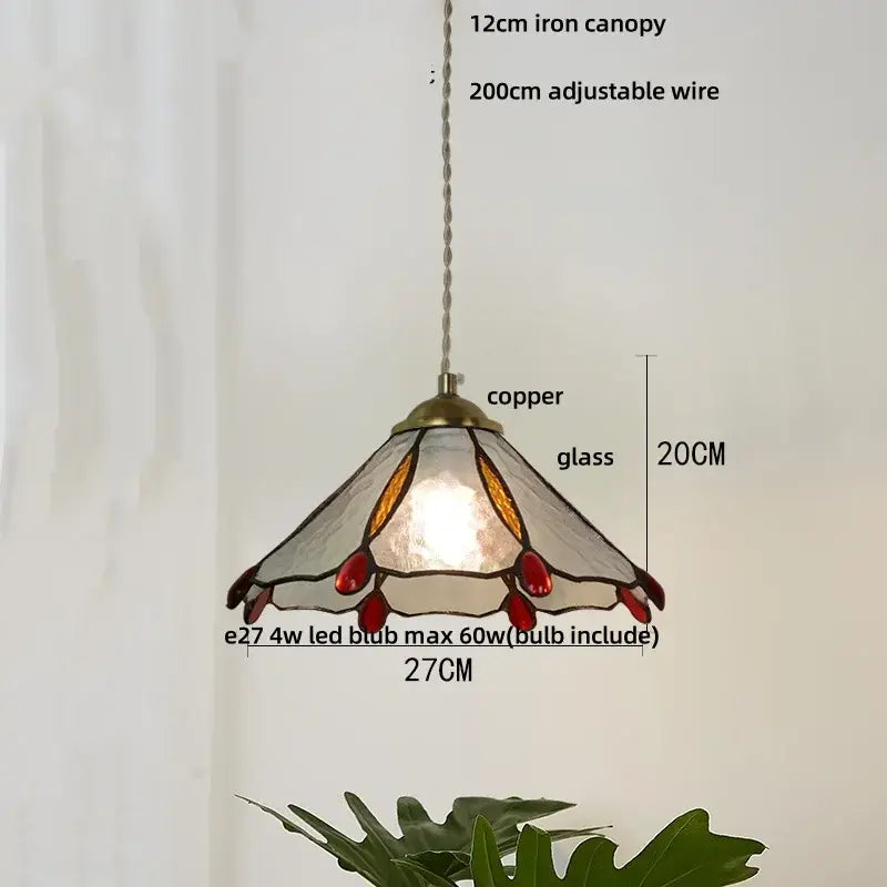 Vintage green glass pendant light with copper tiffany-style frame and stained glass shade with red and amber accents