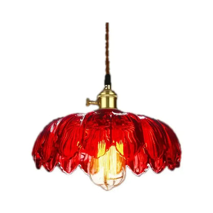 Vibrant red vintage hand blown glass pendant lights with brass fixture and exposed bulb for restaurant and cafe use