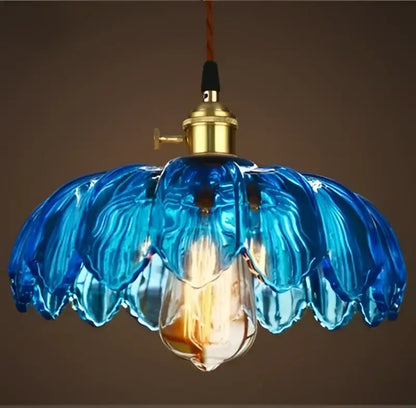 Vintage hand blown blue glass pendant lights with brass fixture and exposed bulb ideal for vintage led cafe use