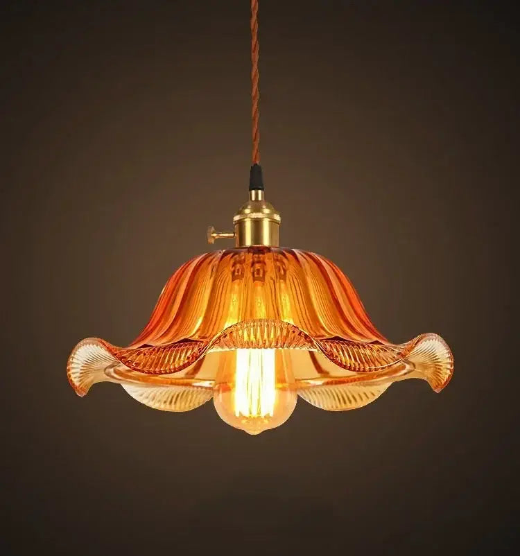 Vintage hand blown amber glass pendant lights with fluted design and brass hardware for restaurant and cafe use