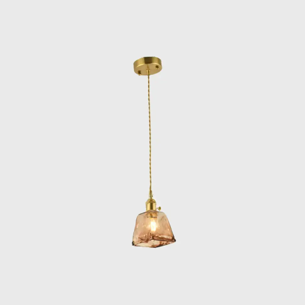 Aubrey vintage handmade tan glass pendant light with handmade brass shaded fixture and brass chain mount