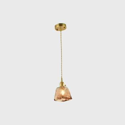 Aubrey vintage handmade tan glass pendant light with handmade brass shaded fixture and brass chain mount