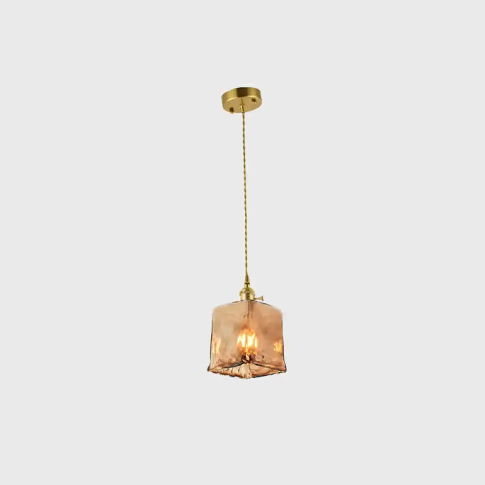 Aubrey vintage handmade brass shaded warm amber tan glass pendant light with metal frame and chain for indoor use