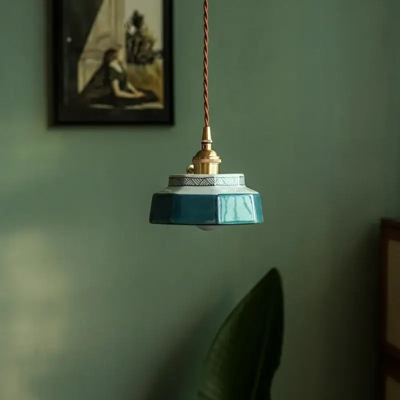 Teal ceramic led pendant light with brass fixture and braided cord from decorbites ceramic led kitchen collection