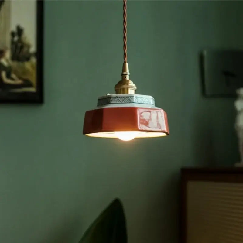 Vintage warm-toned hexagonal red and white ceramic led pendant light with brass hardware for kitchen decorbites ceramic led