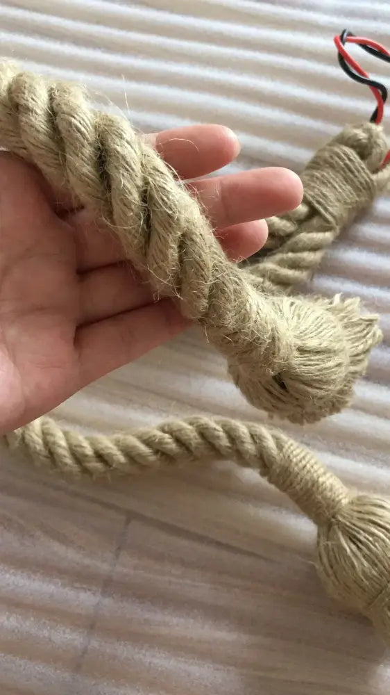 Vintage industrial beige hemp rope pendant lights with frayed ends and exposed red and black wires for bedroom decorbites decor