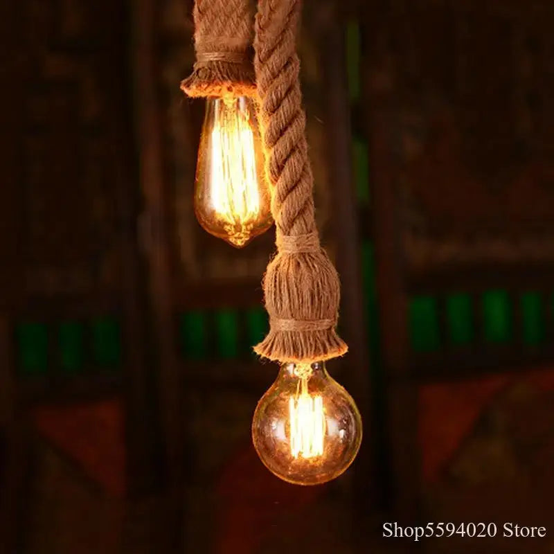 Vintage industrial beige hemp rope pendant lights featuring two glowing filament bulbs for bedroom decorbites hemp rope décor