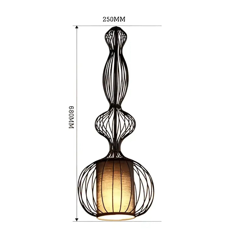 Vintage industrial black birdcage chandelier with a warm amber-lit woven fabric shade by decorbites birdcage chandelier