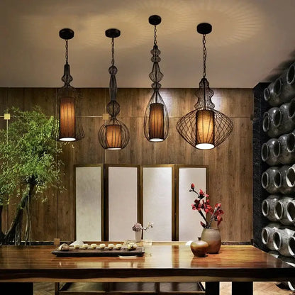 Four ornate dark metal vintage industrial black birdcage chandelier pendant lights with woven wire cages for dining room decorbites birdcage chandelier