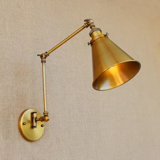 Brass-finished vintage industrial wall lamp with adjustable swing arm and conical shade for bedroom reading decorbites adjustable swing
