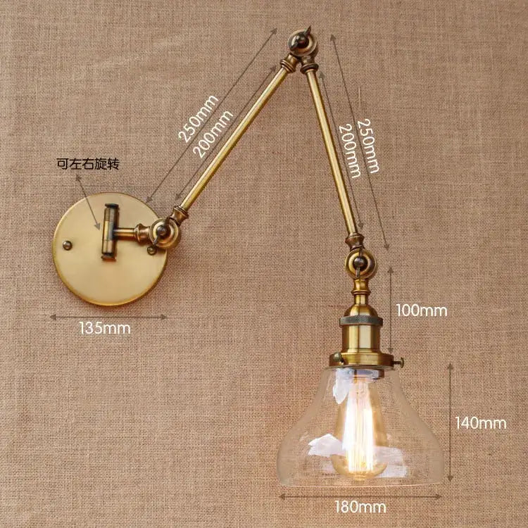 Vintage industrial brass glass ball swing arm bedroom sconce with adjustable wall mount and clear glass shade