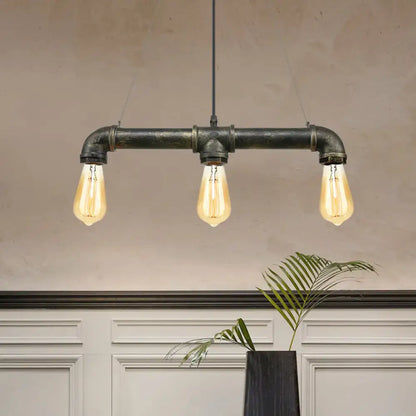 DecorBites™ vintage brass pipe ceiling light fixture with three exposed bulbs in iron industrial-style frame