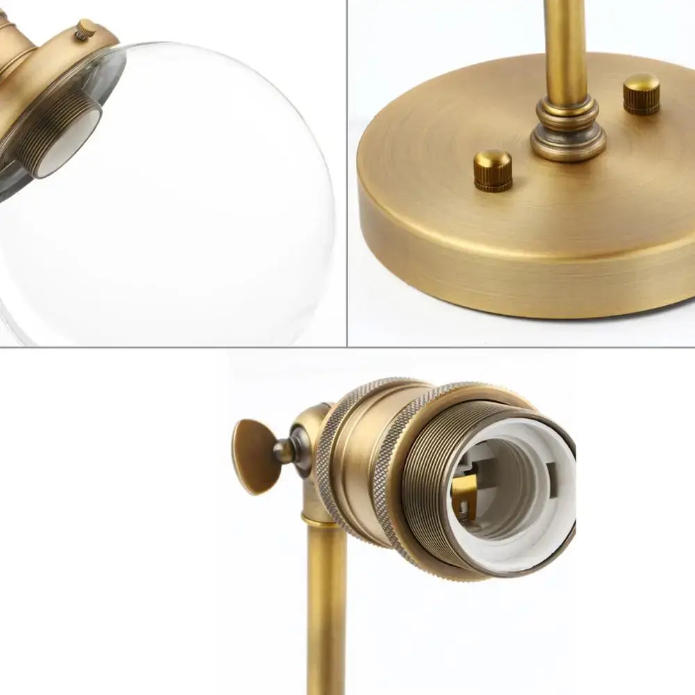 Antique brass-finished vintage industrial wall sconce with clear glass globe and threaded metal base for decorbites vintage industrial decor
