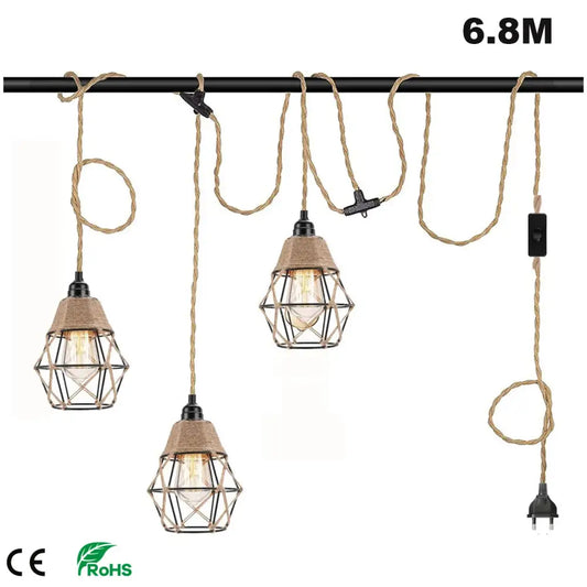 Vintage industrial pendant light with black metal cage and beige hemp rope cords for dining room fixture