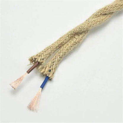 Two beige braided hemp rope woven textile wires with exposed copper and insulated ends for living room cord use