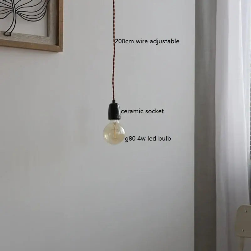 Vintage industrial matte white ceramic led pendant lamp with a g80 4w led bulb in black socket and red braided wire decorbites ceramic led