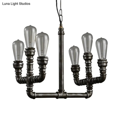 Lámpara colgante de estilo industrial vintage, de metal oxidado, con diseño de 6 bombillas abiertas y tubo para colgar.