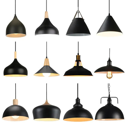 Vintage iron black pendant lights with black matte finish, warm interior, and wooden or brass accents for living room decor