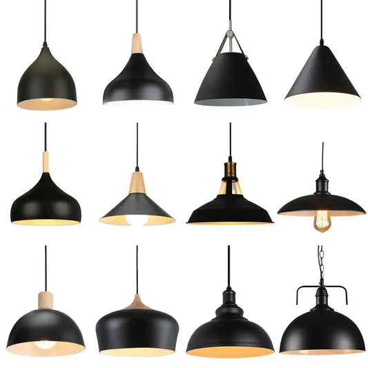 Vintage iron black pendant lights with black matte finish, warm interior, and wooden or brass accents for living room decor