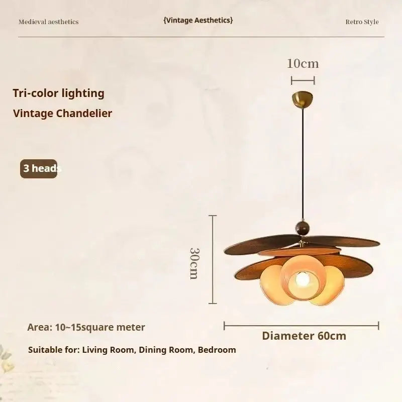 Vintage layered wood petal pendant light with tri-color brass accent and three ornate disc lights for dining room use